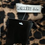 Gallery Sukienka w Panterkę L 40 EU - zdjęcie 1